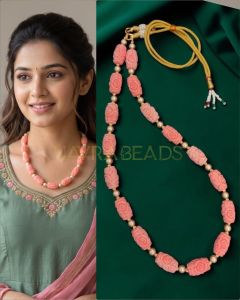 Navrabeads Synthetic Coral Carved Beads with Swarovski Replica Gold Pearls Necklace