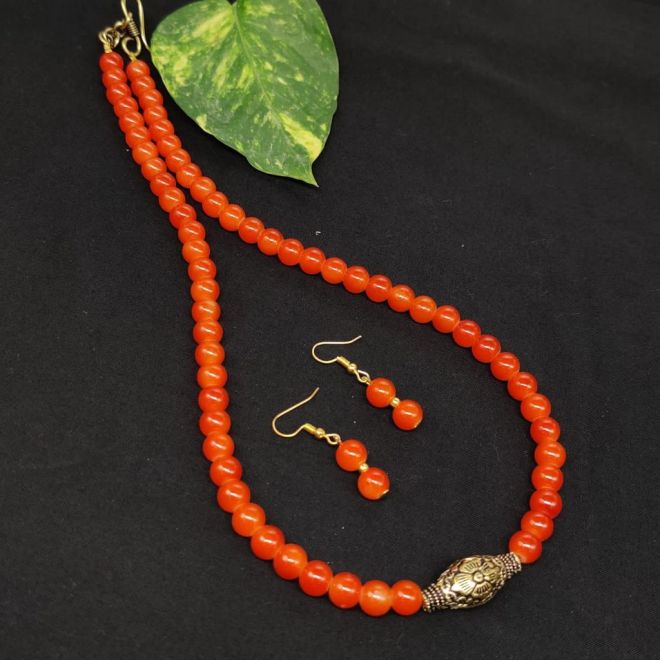 Bohemian style jewelry. Handmade earrings and beaded necklace. Beauty &  Fashion Stock Photos | Creative Market