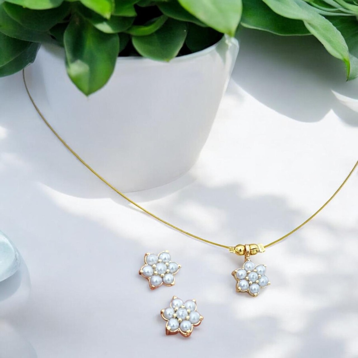 AD Flower Pendant In Invisible Wire with Earrings ,Opaque pearl